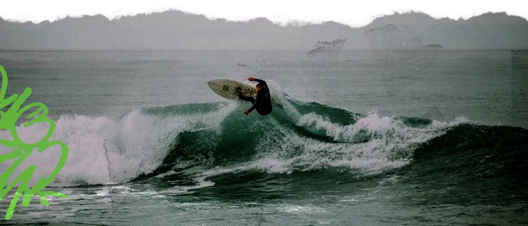 Surfer ripping a wave